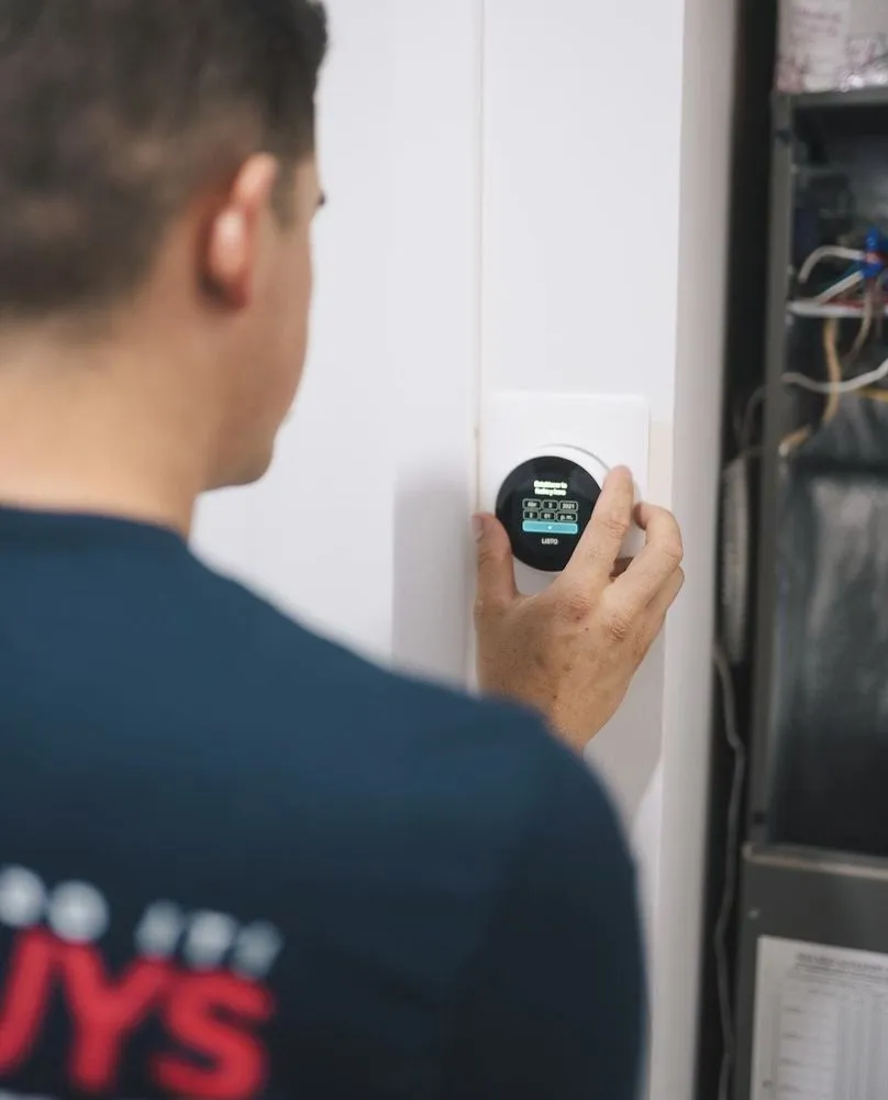 Slide of The AC Guys