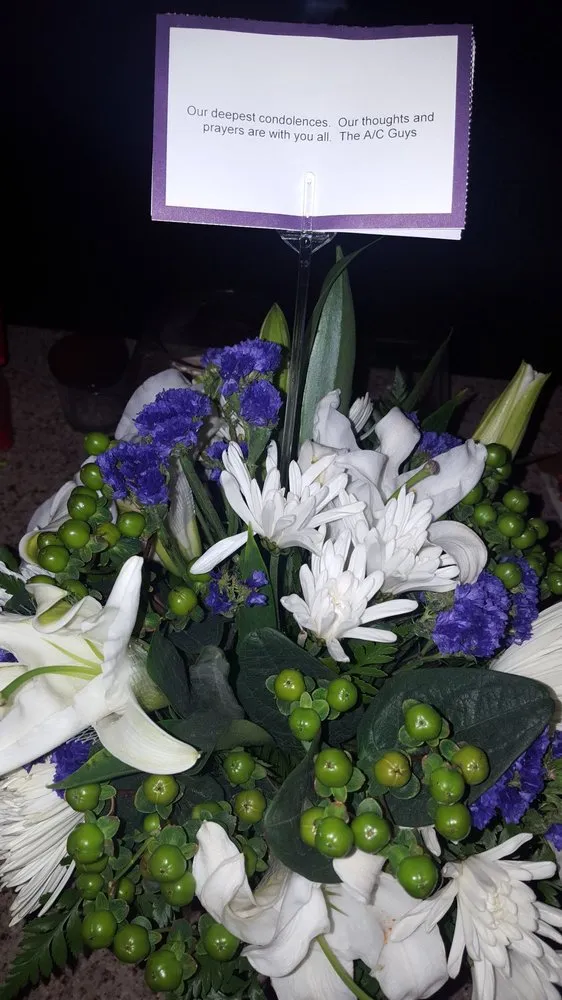 Slide of The AC Guys