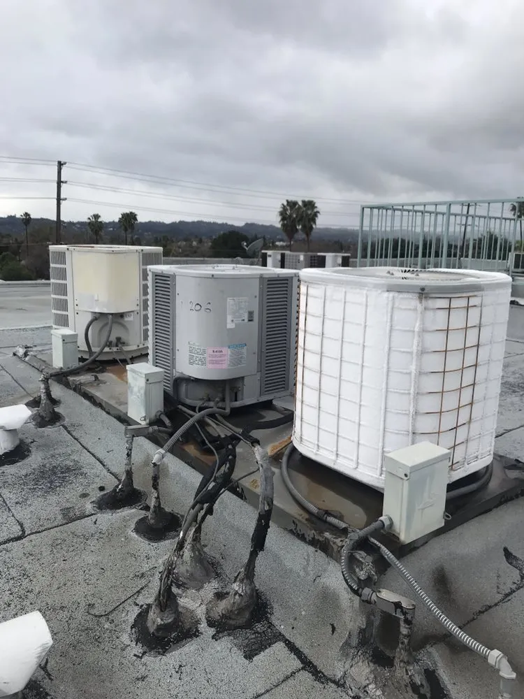 Slide of The AV/AC Guys