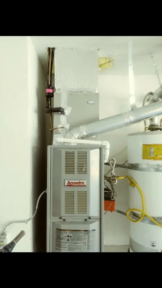 Slide of The H-VAC GUYS