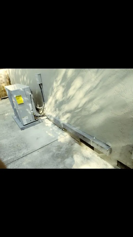 Slide of The H-VAC GUYS