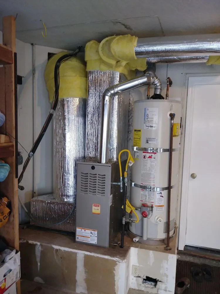 Slide of The H-VAC GUYS