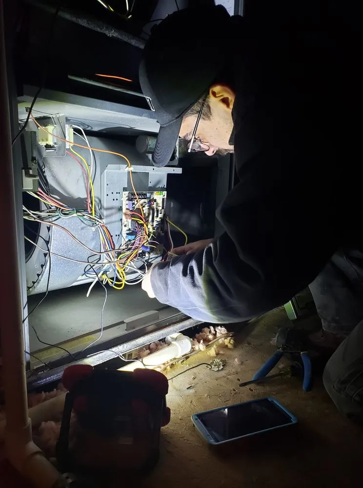 Slide of The Heat and Air Team