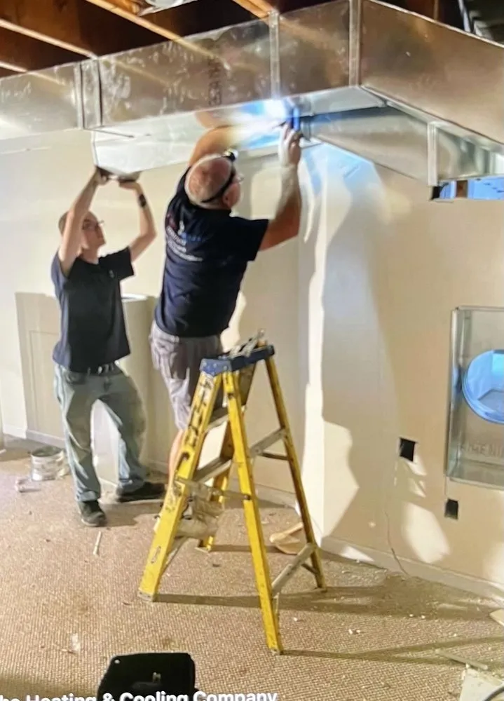 Slide of The Heating & Cooling Company