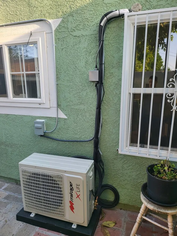 Slide of The HVAC Bros