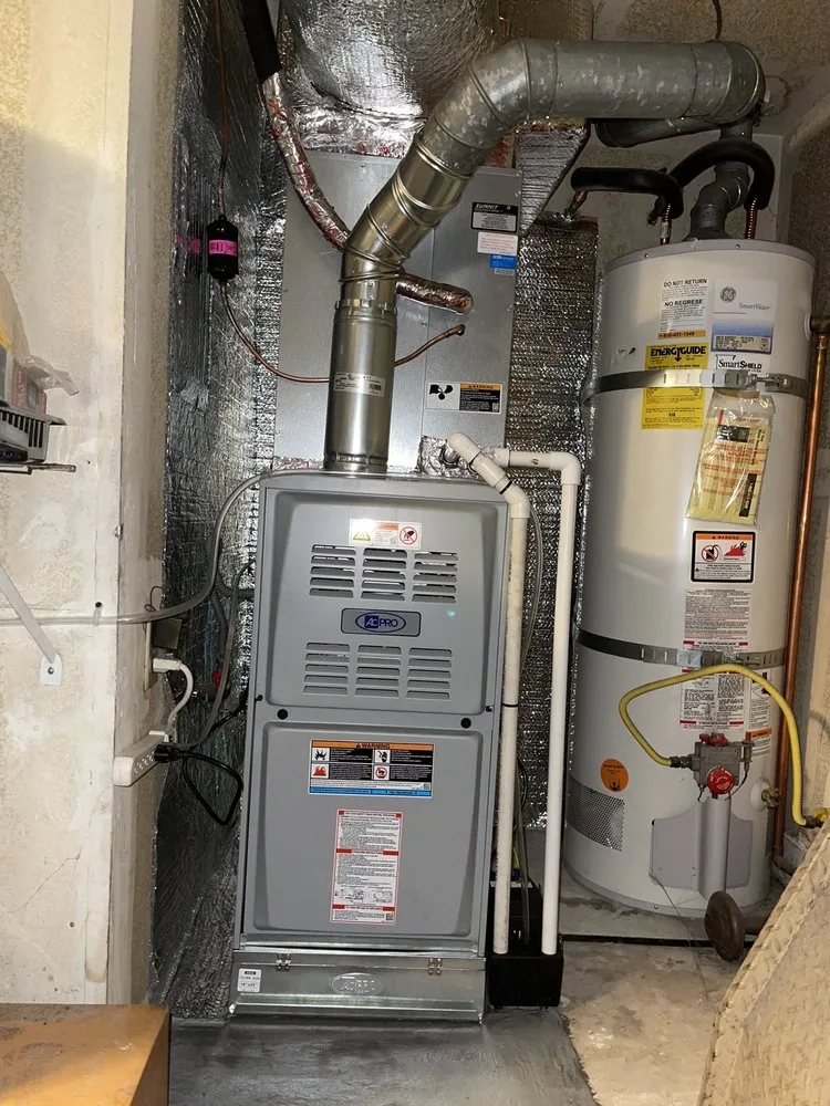 Slide of The HVAC Guys