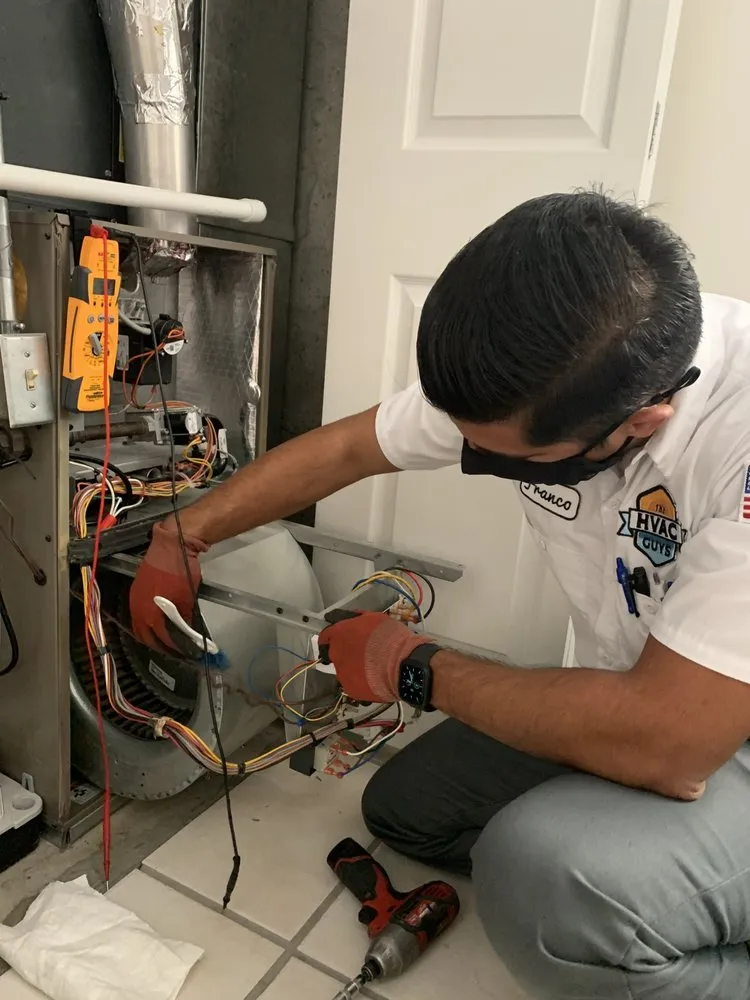 Slide of The HVAC Guys