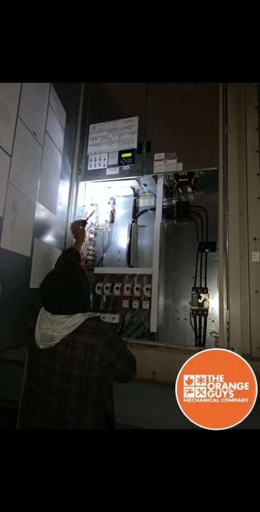 Slide of The Orange Guys Mechanical Company