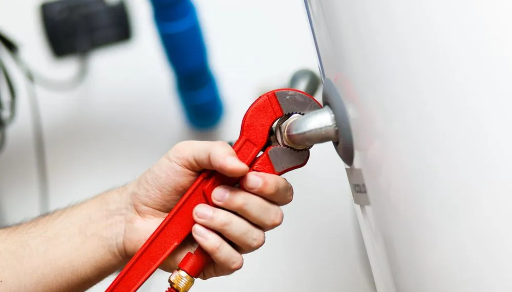 Slide of The Plumber Heating & Cooling