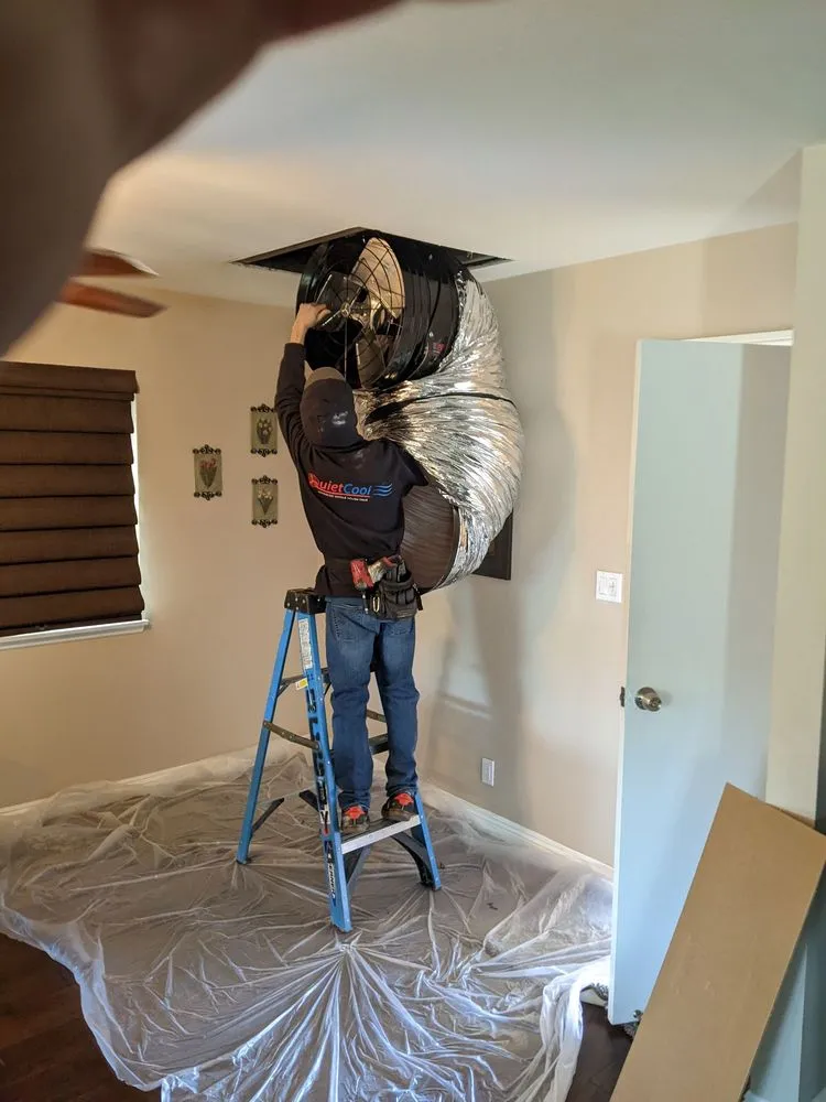 Slide of The QuietCool Guys