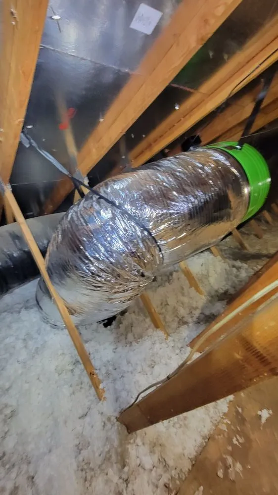 Slide of The QuietCool Guys