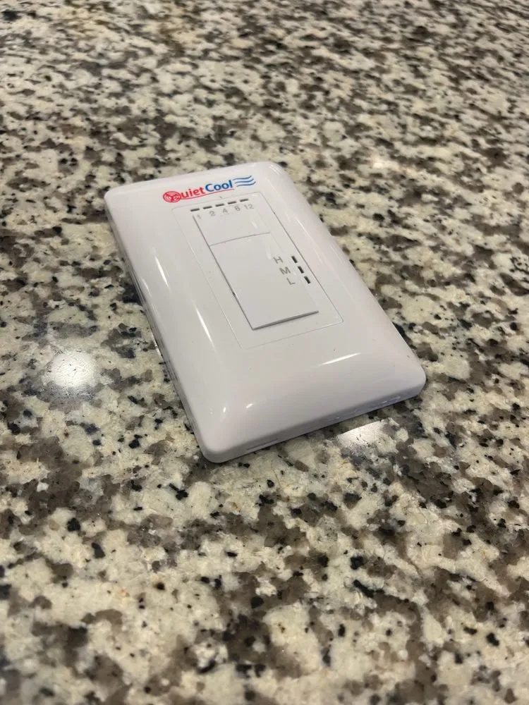 Slide of The QuietCool Guys