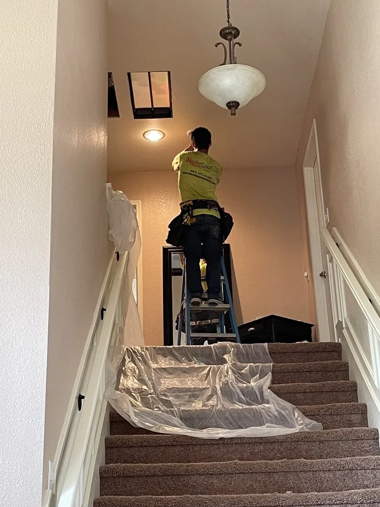 Slide of The QuietCool Guys