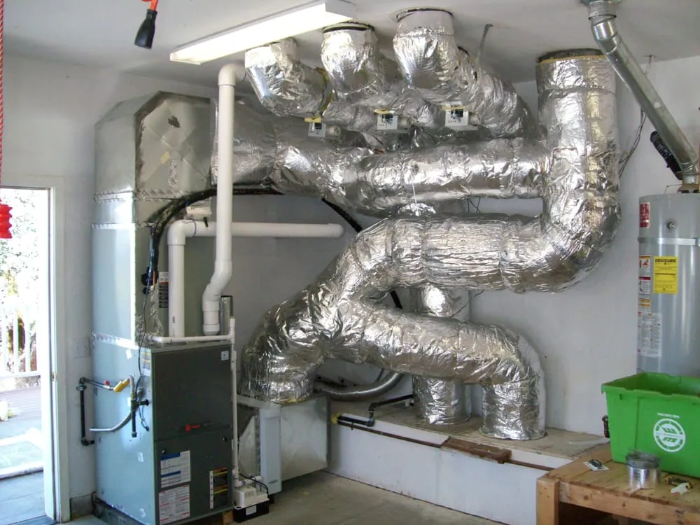 Slide of The Real McCoy Heating and Air Conditioning inc.