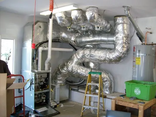 The Real McCoy Heating and Air Conditioning inc. Logo