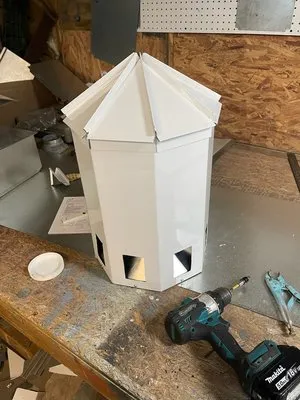 The Tin Man Air Conditioning Logo