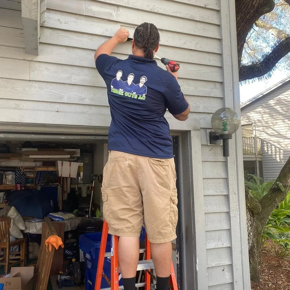 Slide of Three Guys A/C & Electrical