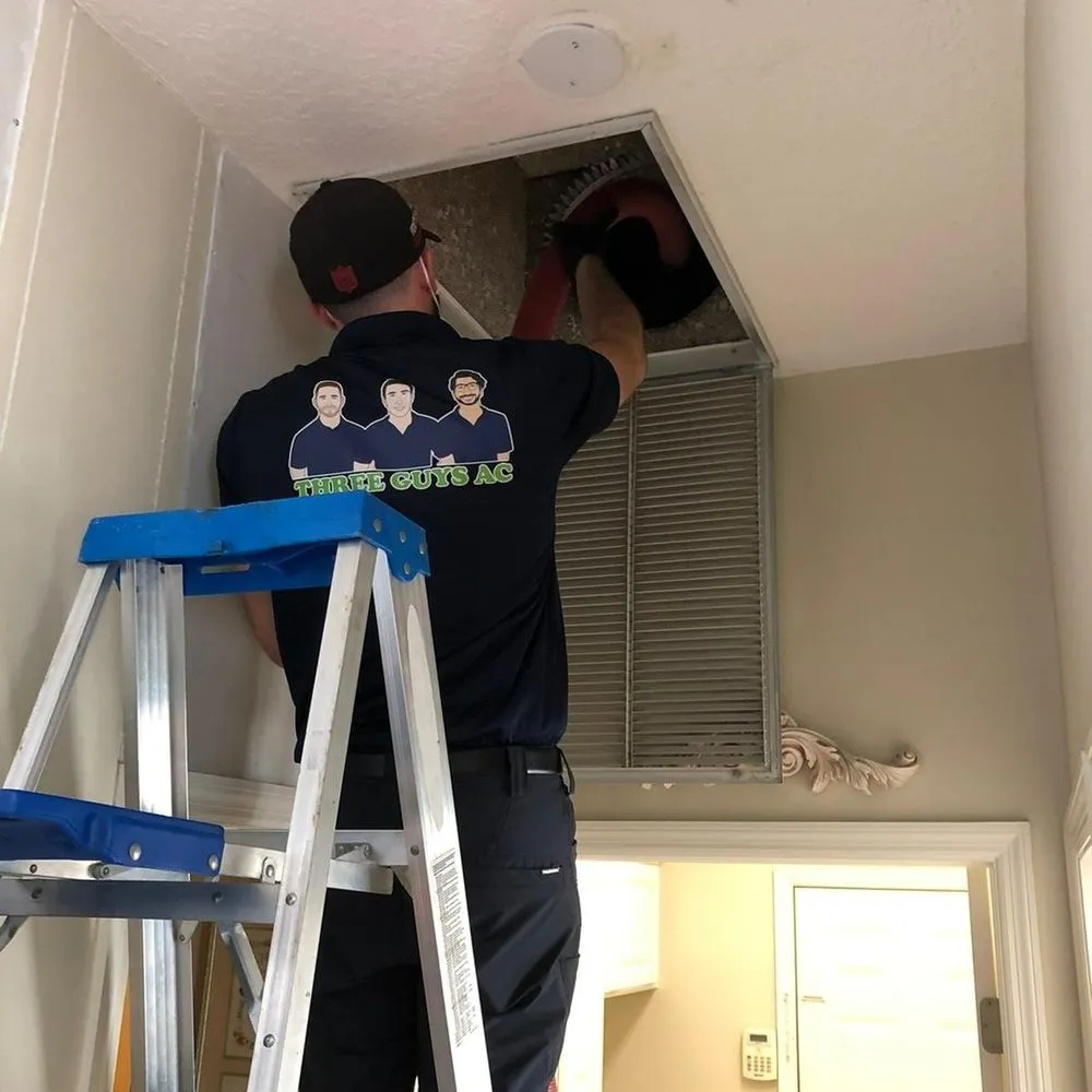 Slide of Three Guys A/C & Electrical