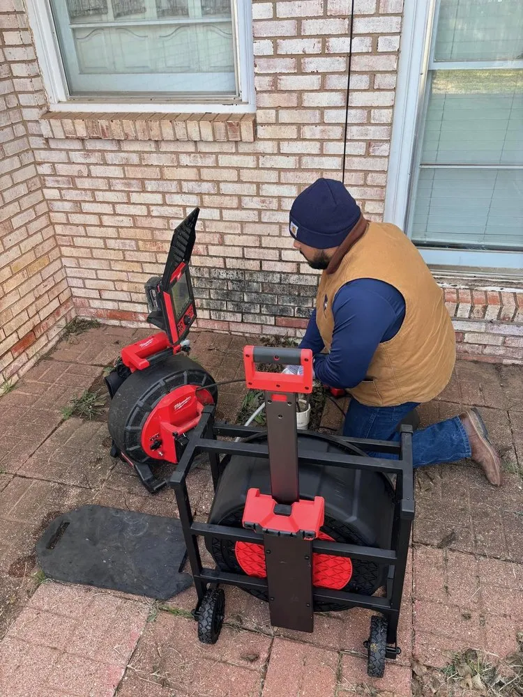 Slide of Tim's Plumbing & Drain Cleaning