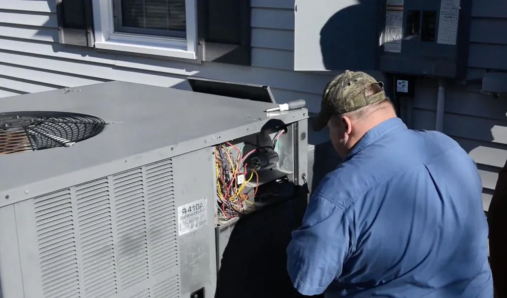 Slide of Tin Man Heating & Cooling