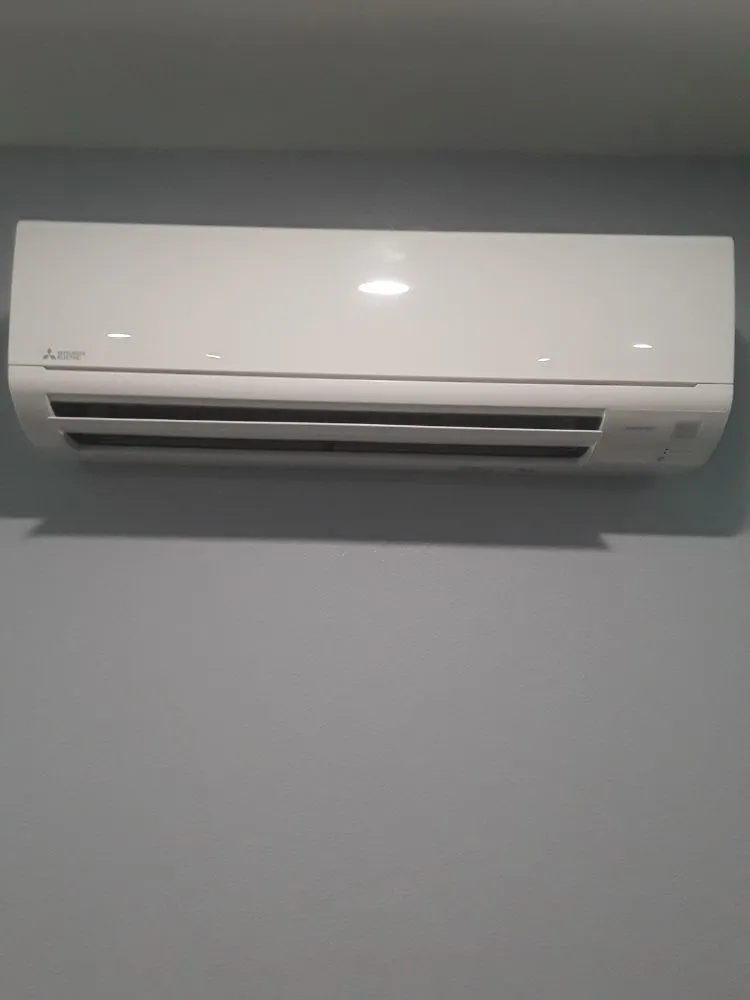 Slide of Titan Heating & Air
