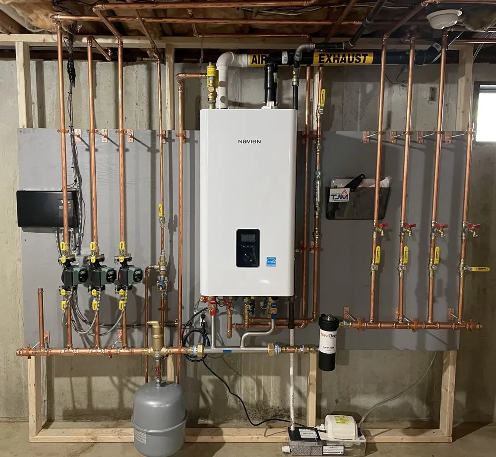 Slide of TJM Plumbing & Heating