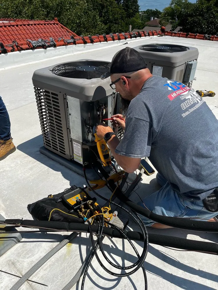 Slide of TJ's Heating & Cooling