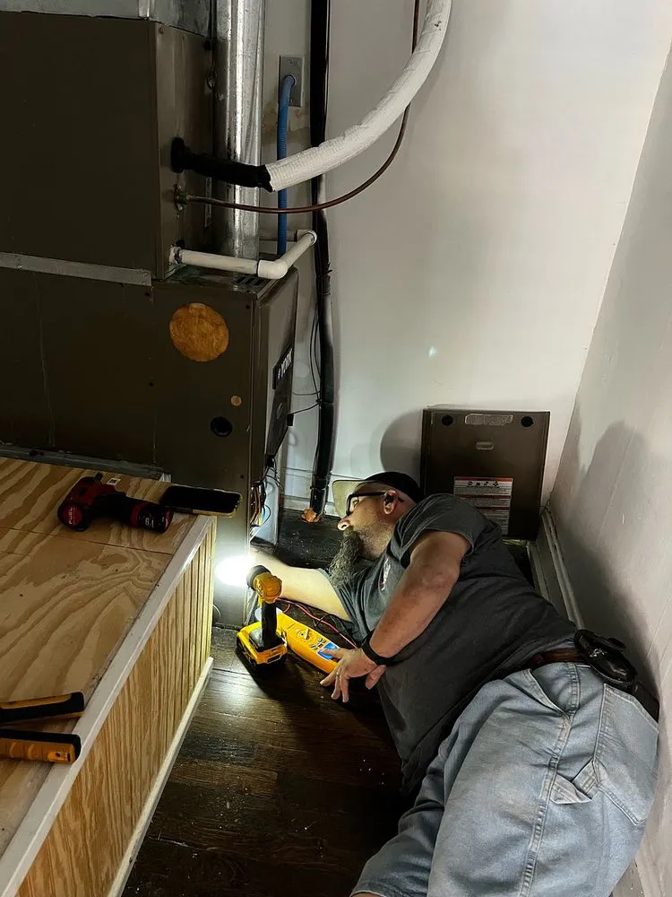 Slide of TJ's Heating & Cooling