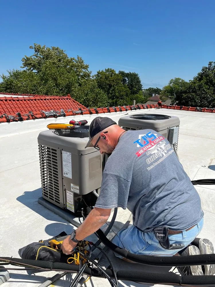 Slide of TJ's Heating & Cooling