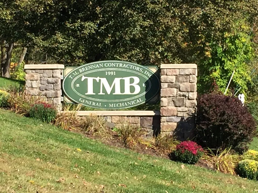 Slide of TM Brennan Services