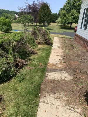 TM Land Management & HVAC Logo