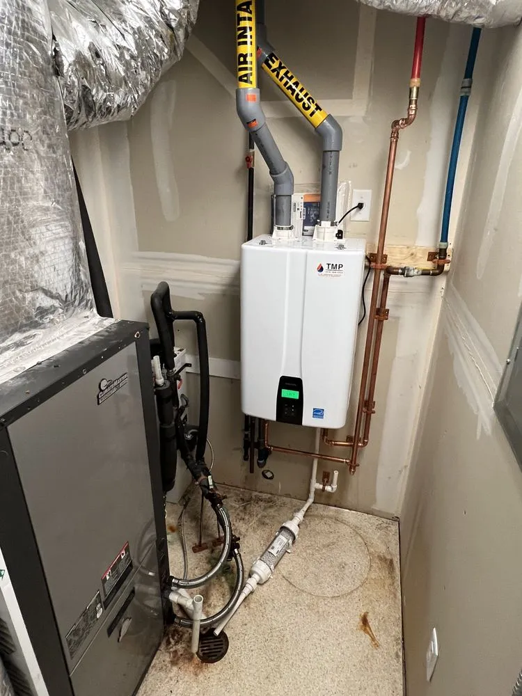 Slide of TMP Plumbing & Heating