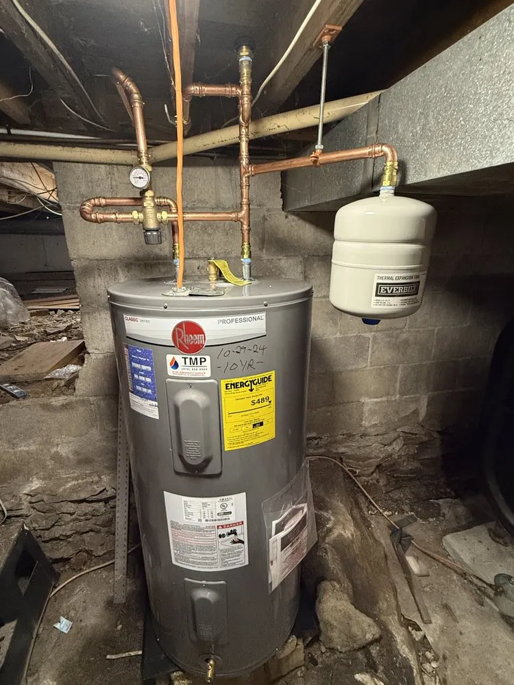 Slide of TMP Plumbing & Heating