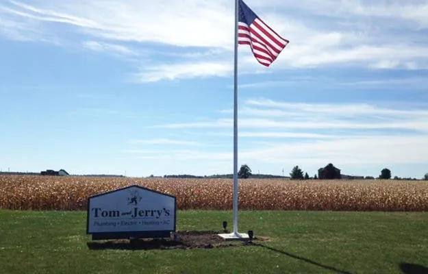 Slide of Tom & Jerry's Plumbing Electric Heating Air Conditioning