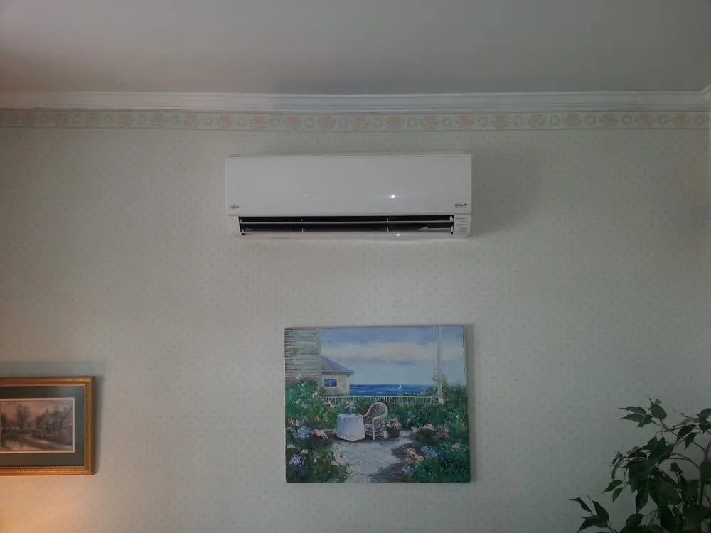 Slide of Tommy's Heating and Air Conditioning Repair Service