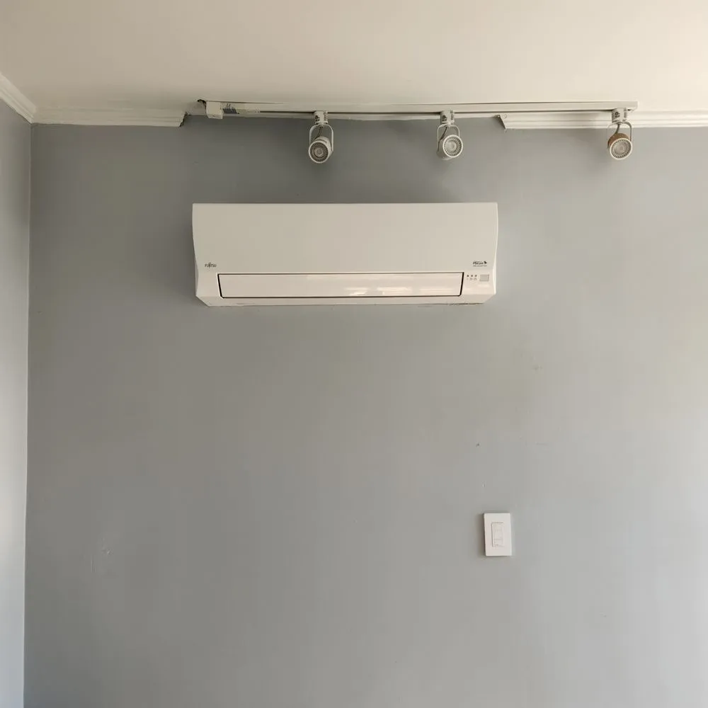 Slide of Tommy's Heating and Air Conditioning Repair Service