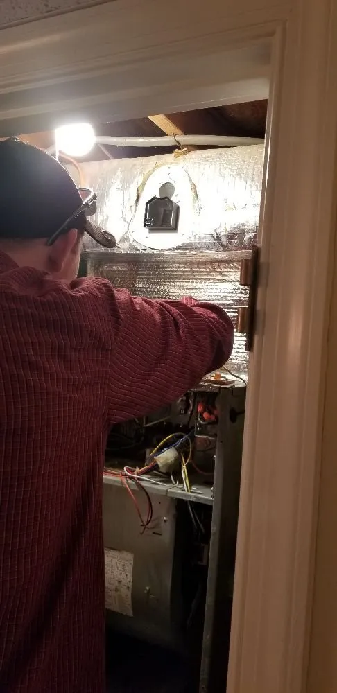 Slide of Toms Heating & Air Conditioning