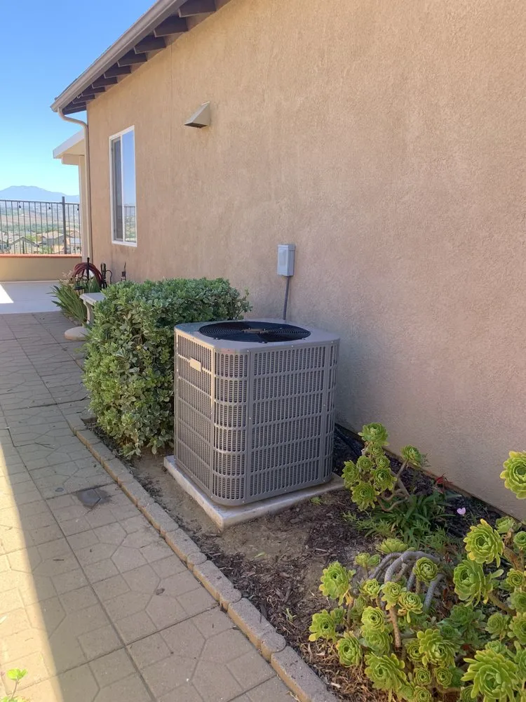 Slide of Tom's Heating & Air Conditioning