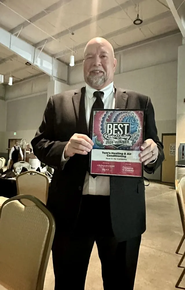 Slide of Tom's Heating & Air Conditioning