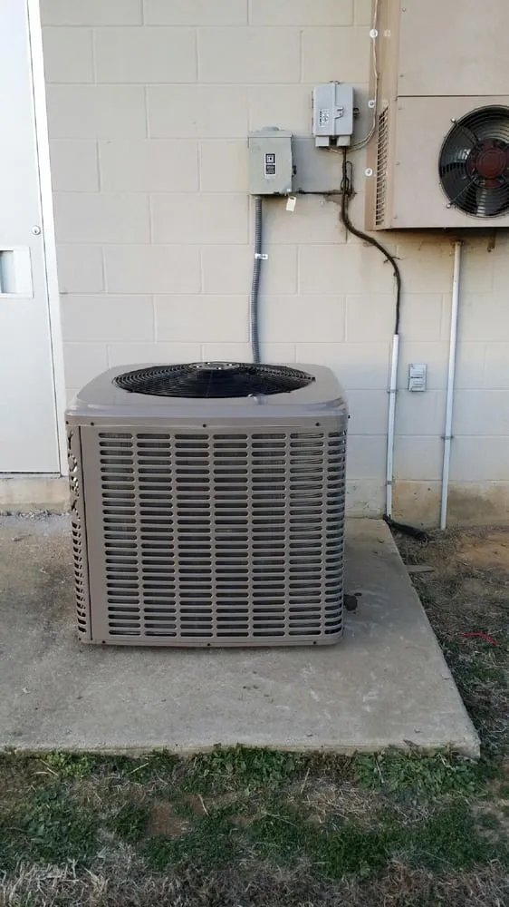 Slide of Tom's Heating & Air Conditioning