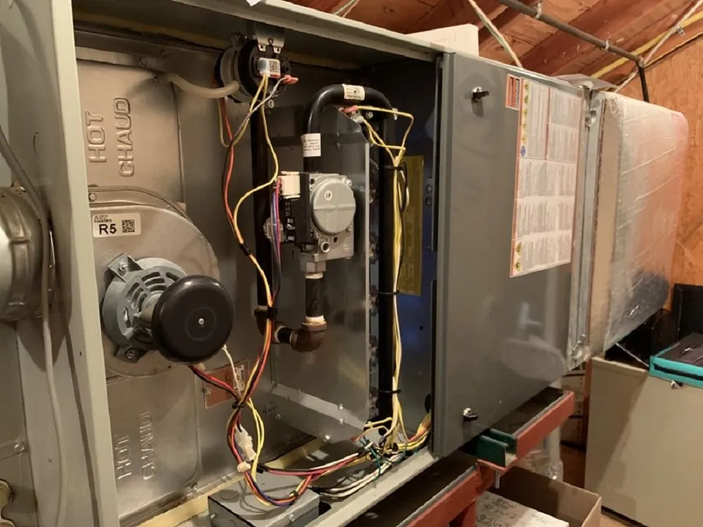 Slide of Tom's Heating & Air Conditioning