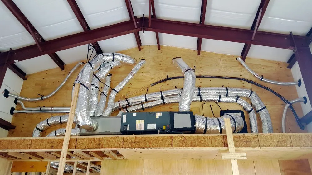 Slide of Tom's Quality Comfort Air & Heat