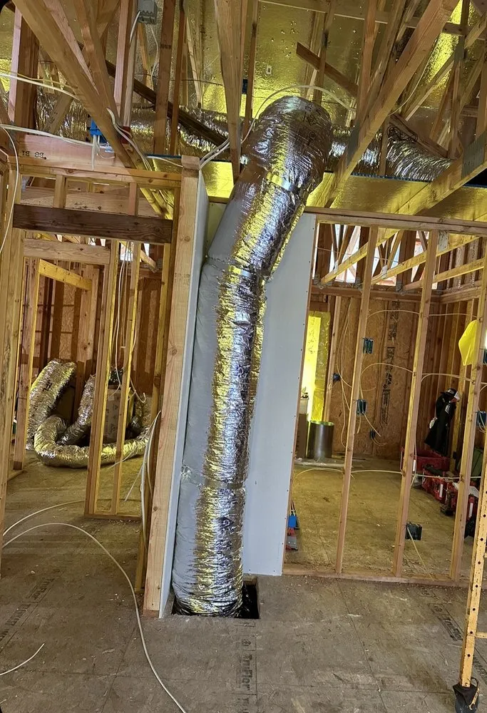 Slide of TopDog HVAC & Facrication