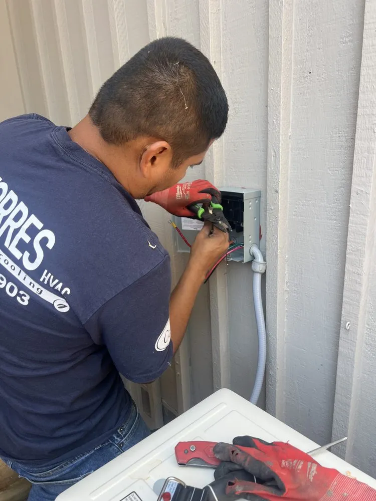 Slide of Torres Heating and Cooling & Electrical