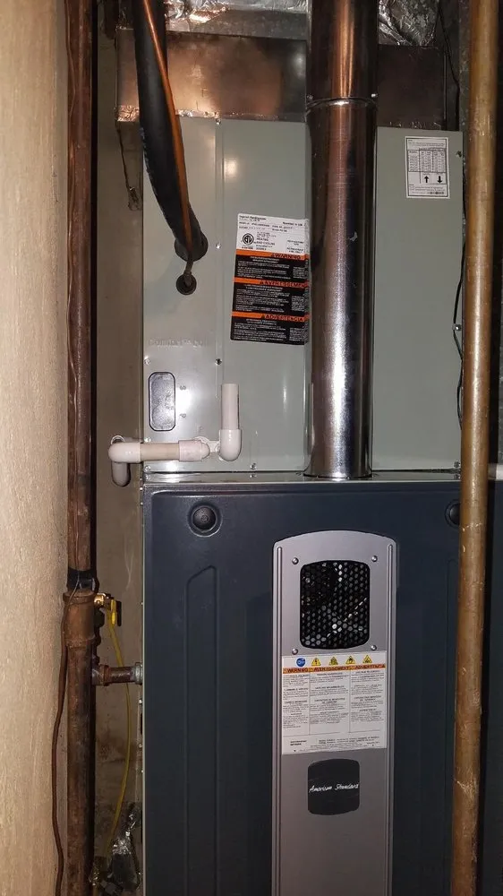 Slide of Toto's Heating & Cooling