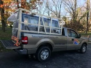 Slide of Toto's Heating & Cooling