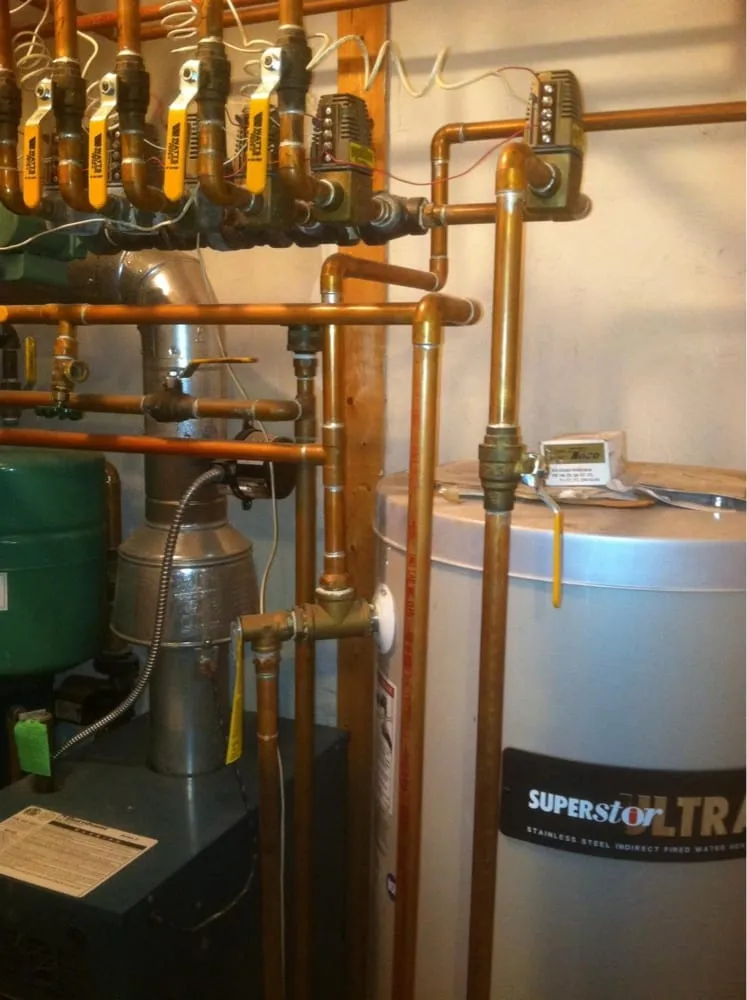 Slide of T.Q. Plumbing & Heating