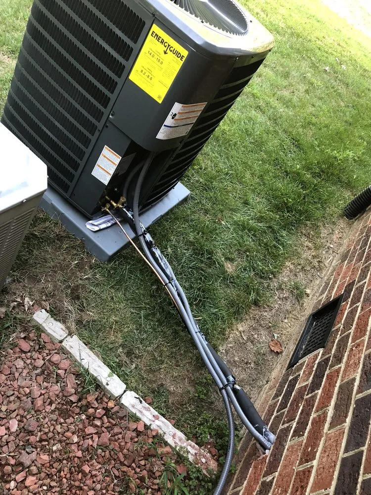 Slide of Travis Heating And Cooling