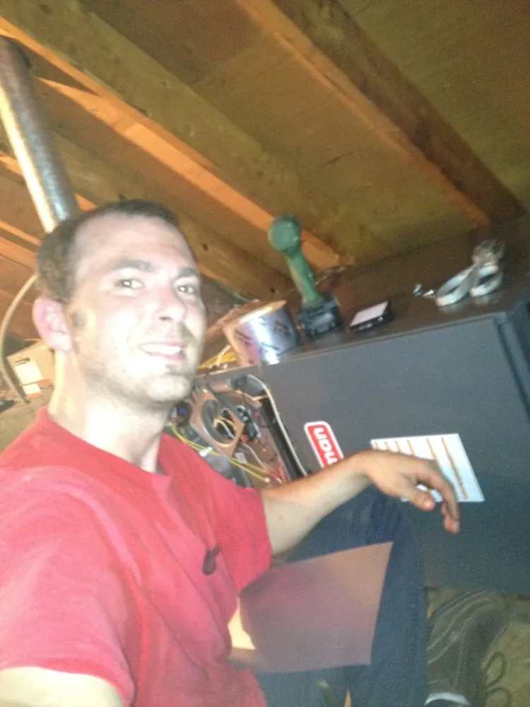 Slide of Travis Heating And Cooling