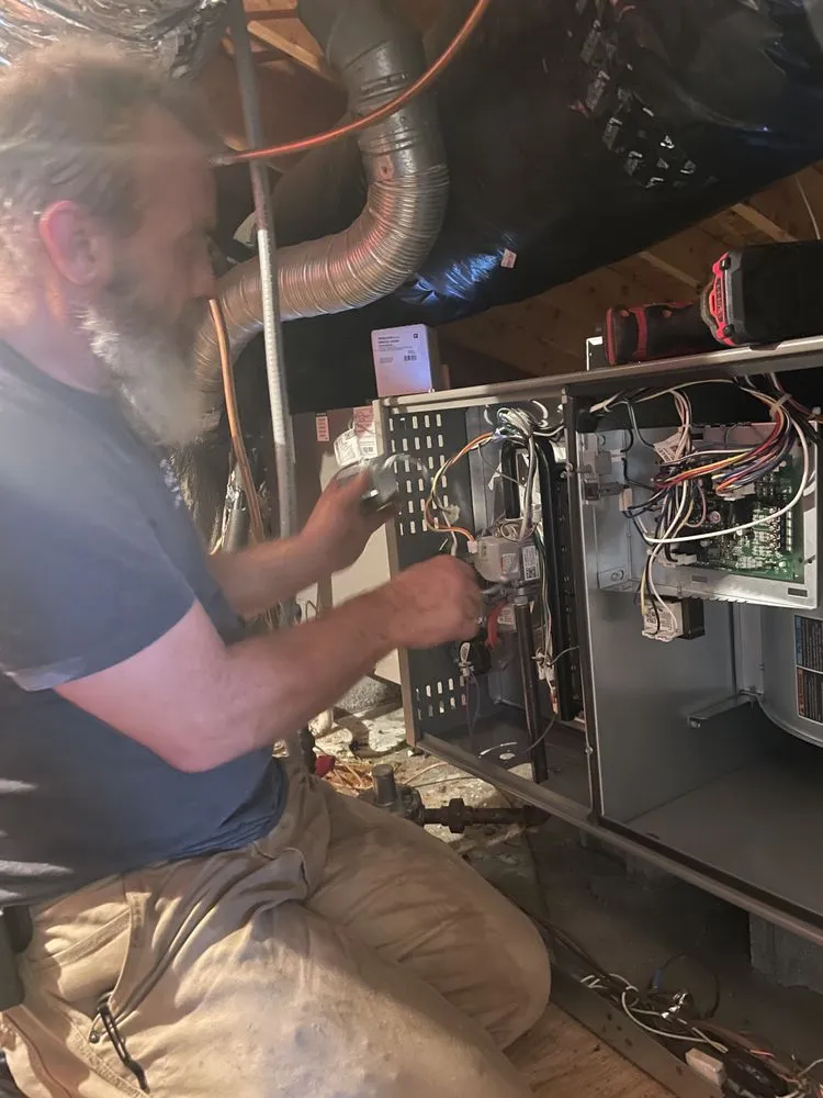 Slide of Travis Heating And Cooling